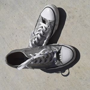 Silver Converse tennis shoes